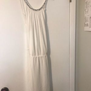 White dress perfect for bridal shower or bachelorette party.